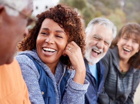 Group,Of,Senior,Friends,On,Hike,In,Countryside,Talking,And Group,Of,Senior,Friends,On,Hike,In,Countryside,Talking,And