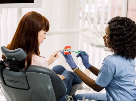 Healthy,Teeth,,Cleaning,With,Toothbrush.,Young,Smiling,African,Woman,Dentist emergency dentist in brisbane