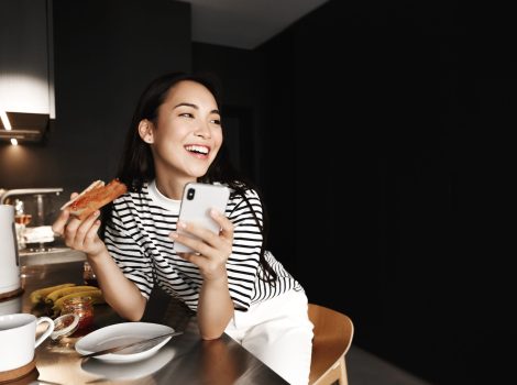 Lifestyle.,Beautiful,Asian,Woman,Resting,At,Home,,Eating,Breakfast,Toast